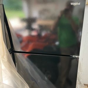 Whirlpool refrigerator never used. Brand new